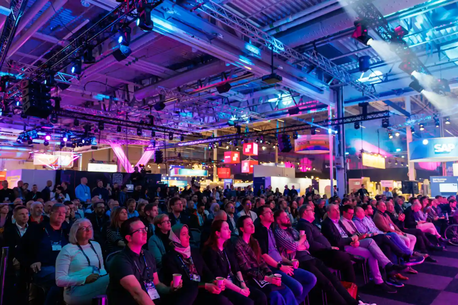 Delegates listening to a keynote presentation on the main stage at the Data Innovation Summit in Stockholm.